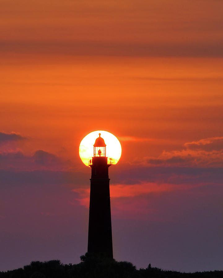 Sunset at the Lighthouse Photograph by Laurie Hasan