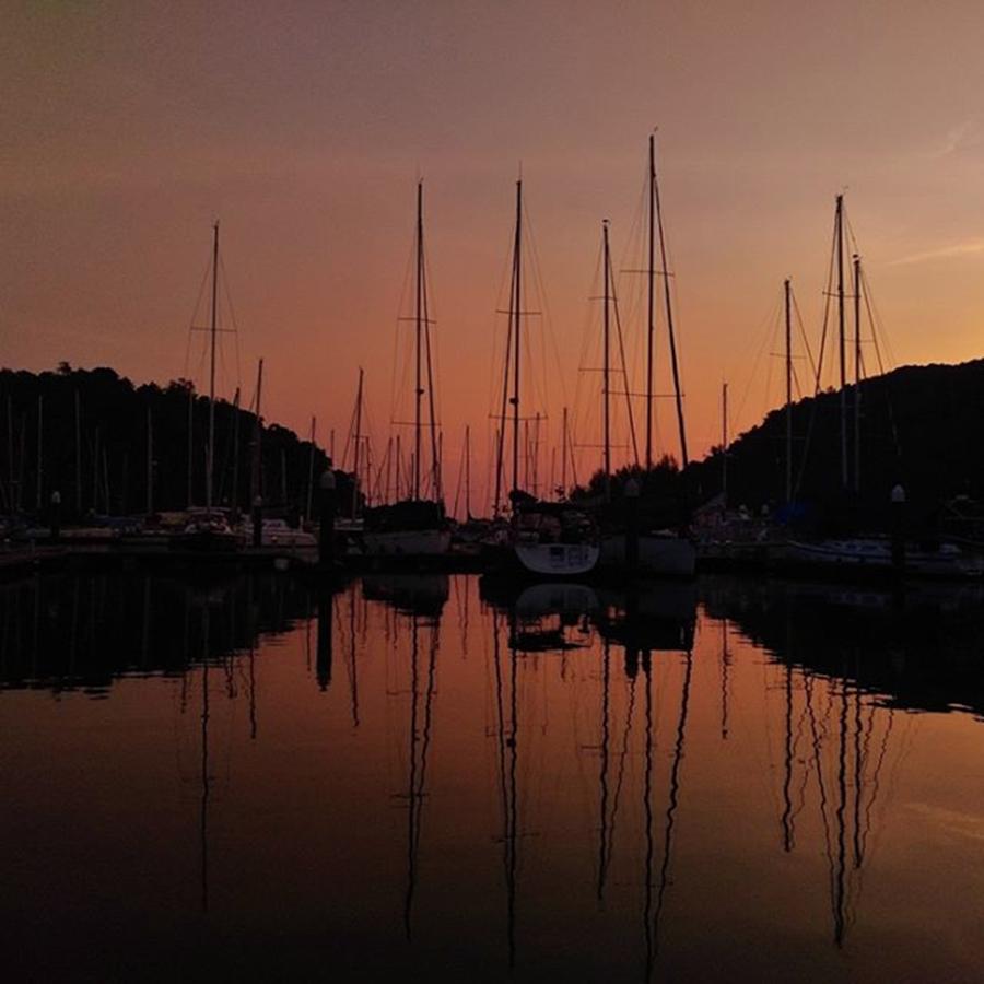 Beach Photograph - Sunset At The Marina. Still Boats, With by Peter M Tan
