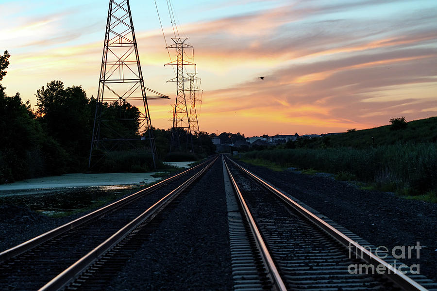 Sunset at the train tracks  Photograph by Sam Rino