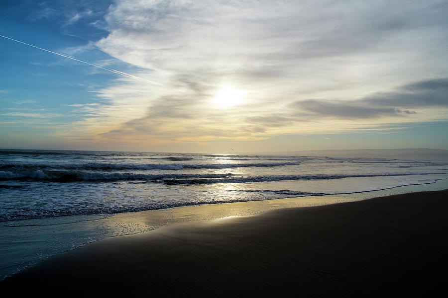 Sunset beach Photograph by Jason Hughes