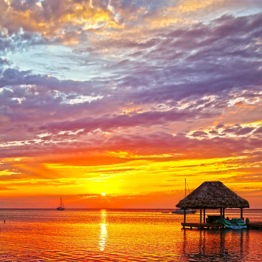 Sunset Caye Caulker Belize Photograph by Lee Vanderwalker