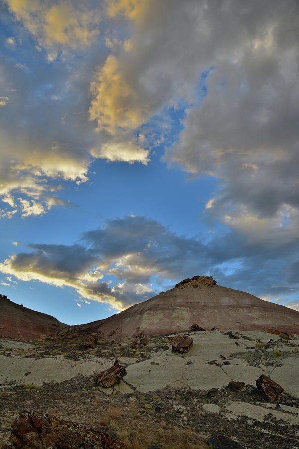 Sunset Clouds Above Bentonite Hills in Grand Junction Photograph by Ray Mathis