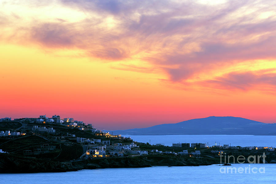 Sunset Clouds over Mykonos Photograph by John Rizzuto