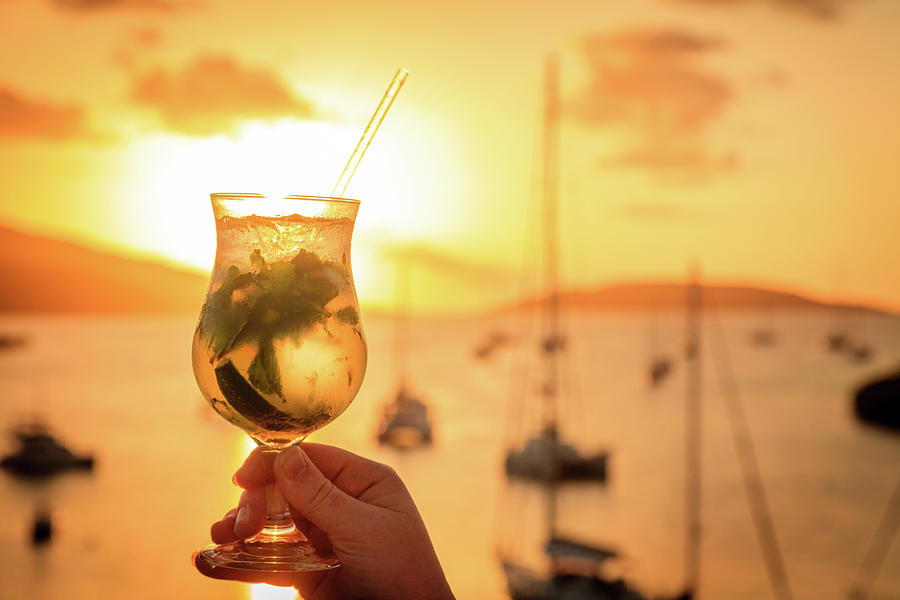 Sunset drink in the islands Photograph by Alexey Stiop