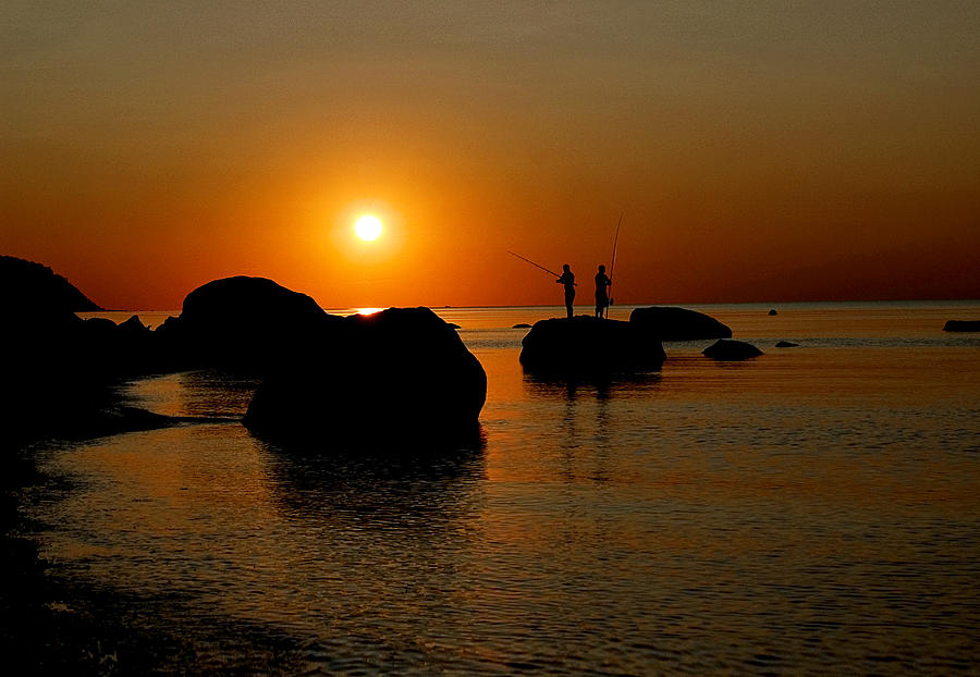 Sunset Fishing Photograph by Patricia Bolgosano