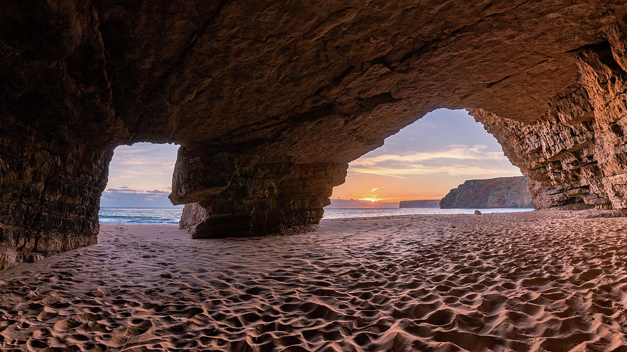Sunset grotto on Praia do Beliche Photograph by Dmytro Korol