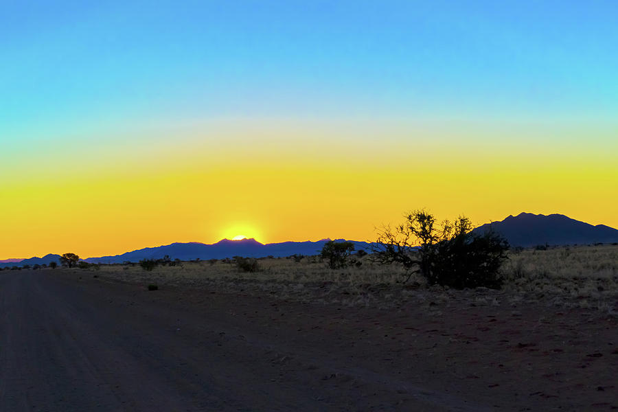 Sunset in Namibian desert. Photograph by Marek Poplawski