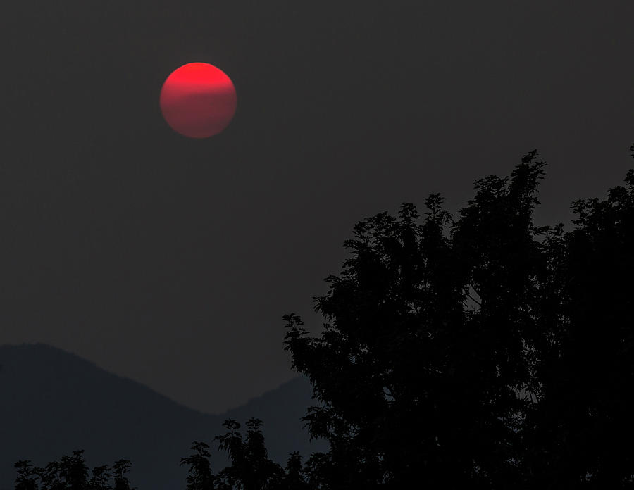 Sunset in Smoky Haze Photograph by Bill Wiebesiek