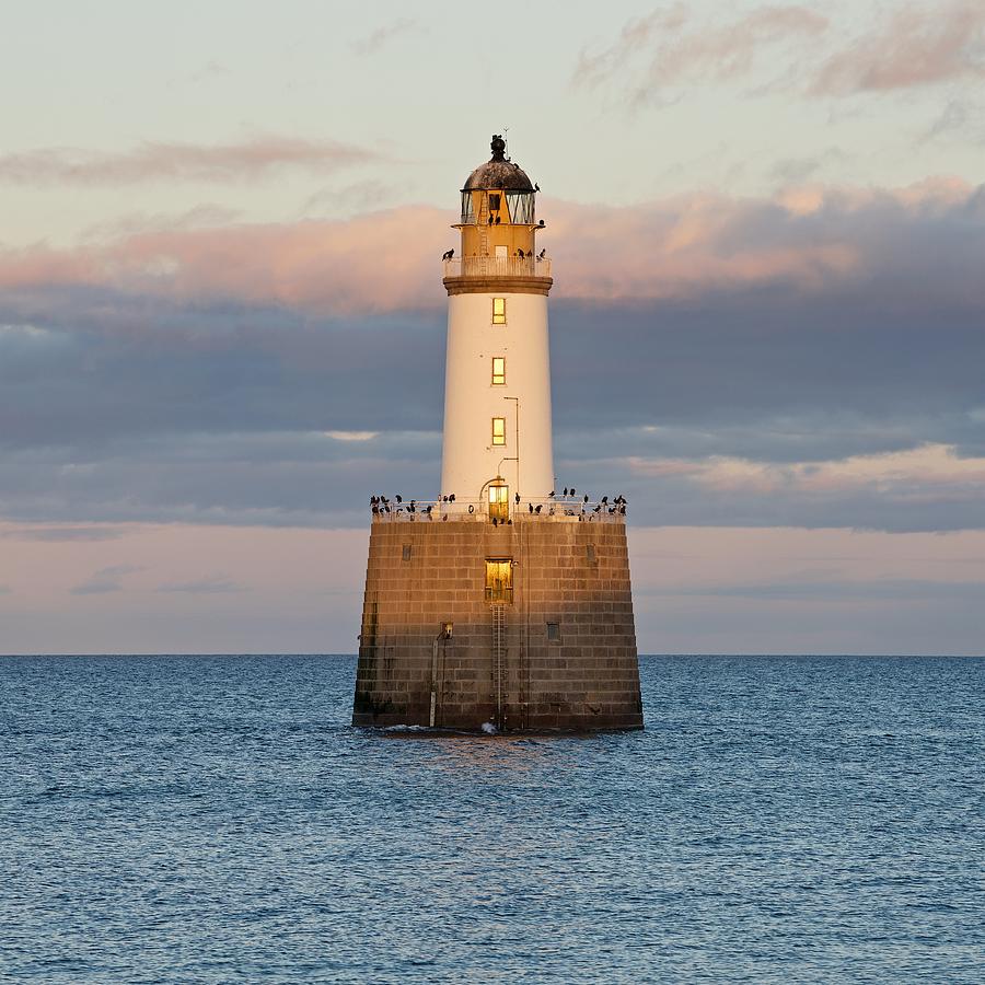 Sunset Light hits Rattray Head Lighthouse Photograph by Stephen Taylor