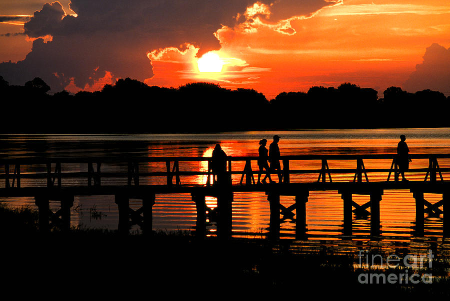 Sunset on Lake Mineola in Clermont Florida Photograph by William Kuta