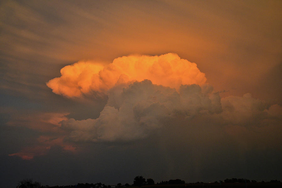 Sunset on Storm Clouds over Colorado Photograph by Ray Mathis