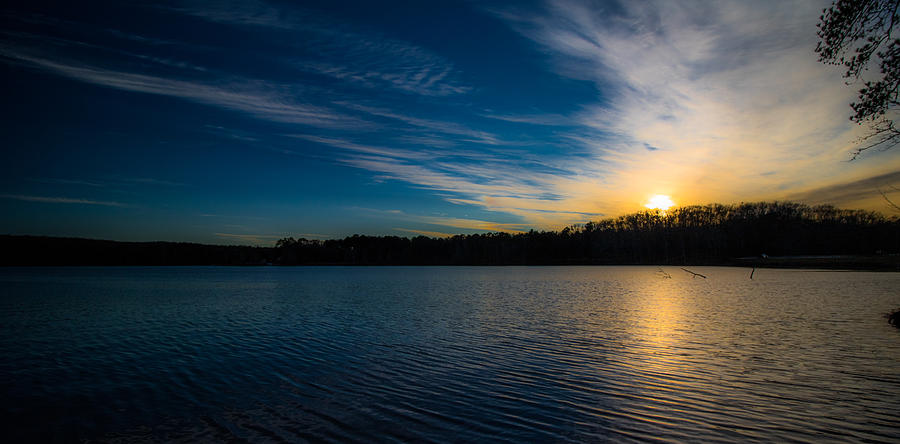 Sunset on the lake Photograph by Mike Dunn
