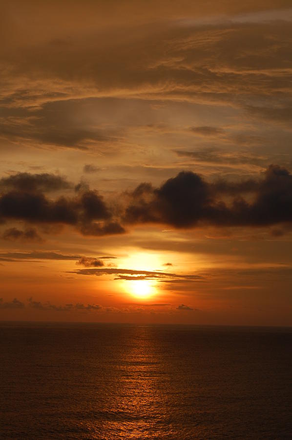 Sunset on the Panama Canal Photograph by Ann and John Cinnamon