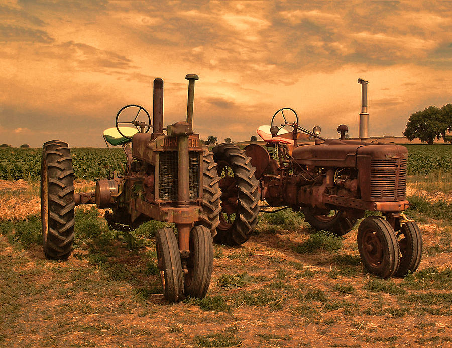 Sunset On The Tractors Photograph