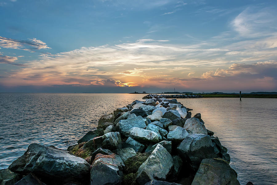 Sunset Over A Rock Jetty On The Chesapeake Bay Photograph