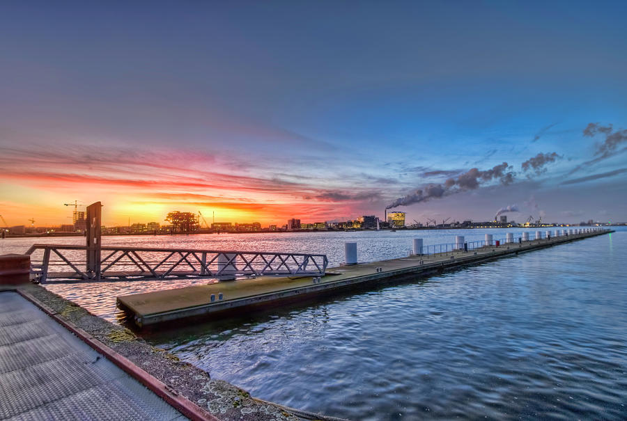 Sunset over Amsterdam Photograph by Nadia Sanowar
