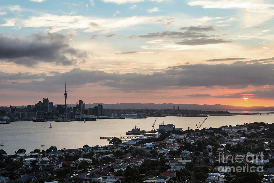 Sunset over Auckland skyline Photograph by Didier Marti