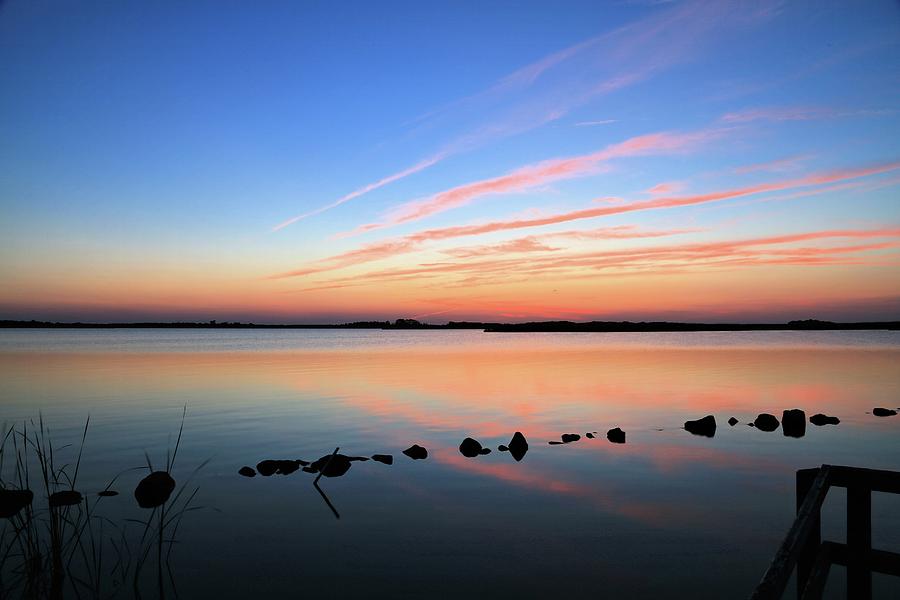 Sunset over Back Bay National Wildlife Refuge Photograph by M C Hood
