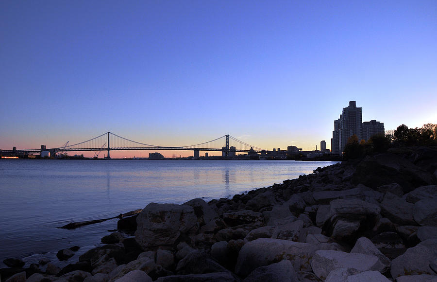 Sunset over Ben Franklin Bridge Photograph by Andrew Dinh