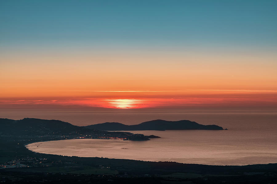 Sunset over Calvi Bay and Revellata in Corsica Photograph by Jon Ingall