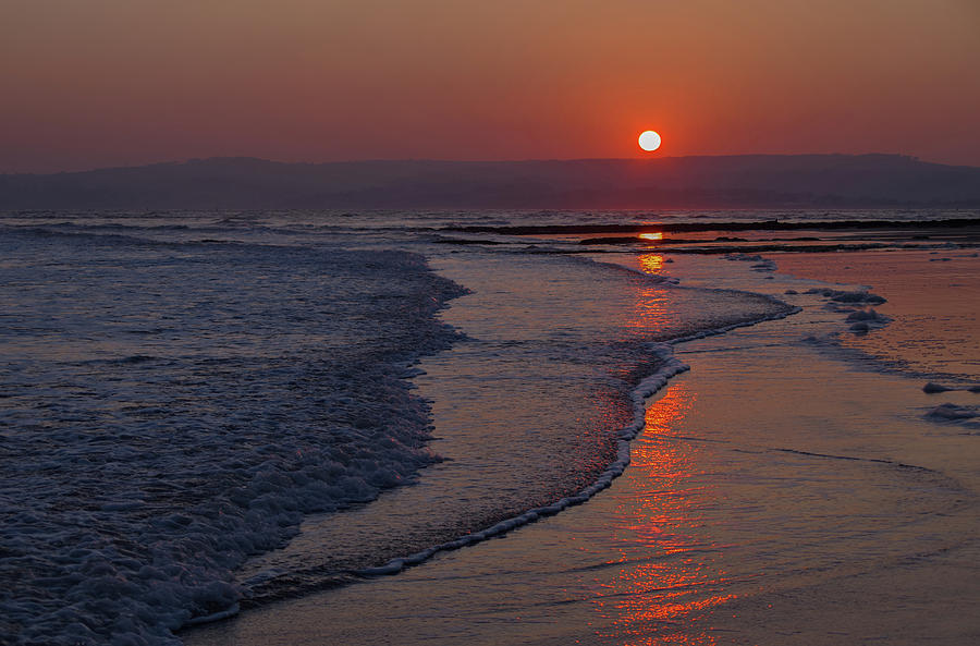 Sunset Photograph - Sunset over Exmouth beach by Pete Hemington
