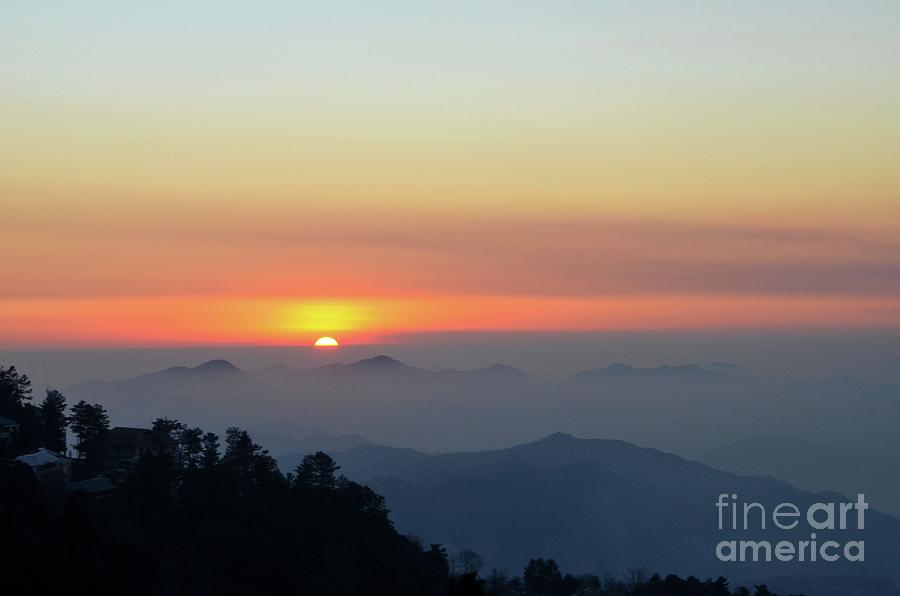 Sunset over mountains and trees of Murree Punjab Pakistan Photograph by Imran Ahmed