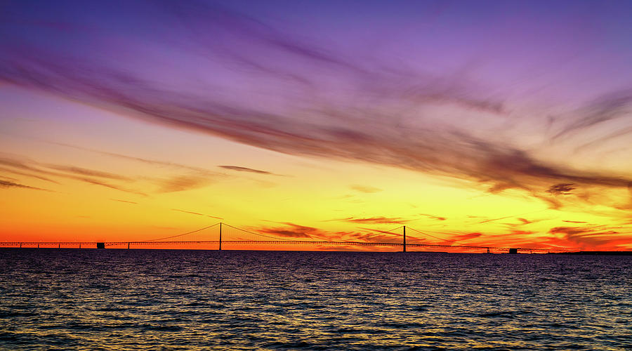 Sunset over Straits of Mackinac Photograph by Alexey Stiop