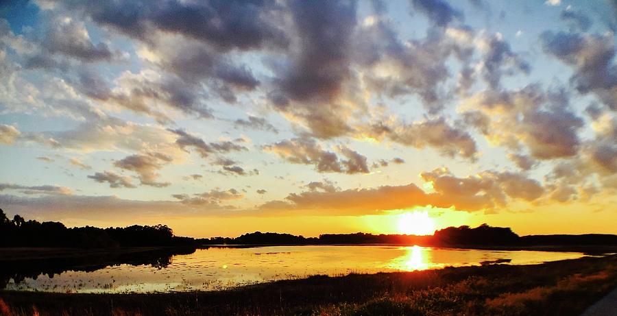 Sunset over the Bombay Hook Marsh Photograph by Shawn M Greener