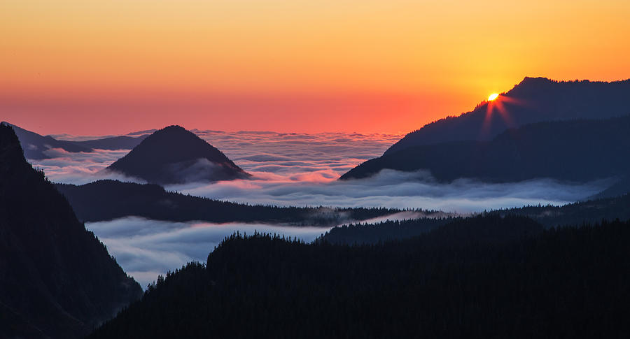 Sunset Over the Clouds Photograph by Angie Vogel