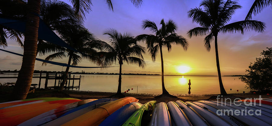 Sunset Photograph - Sunset over the Kayaks by Jon Neidert