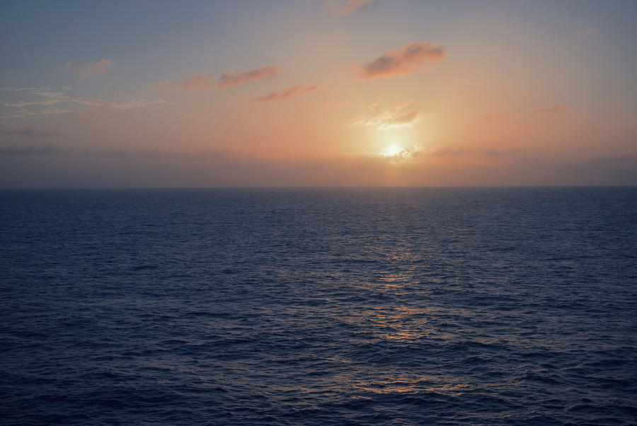 Sunset over the Ocean Photograph by Ray Devlin