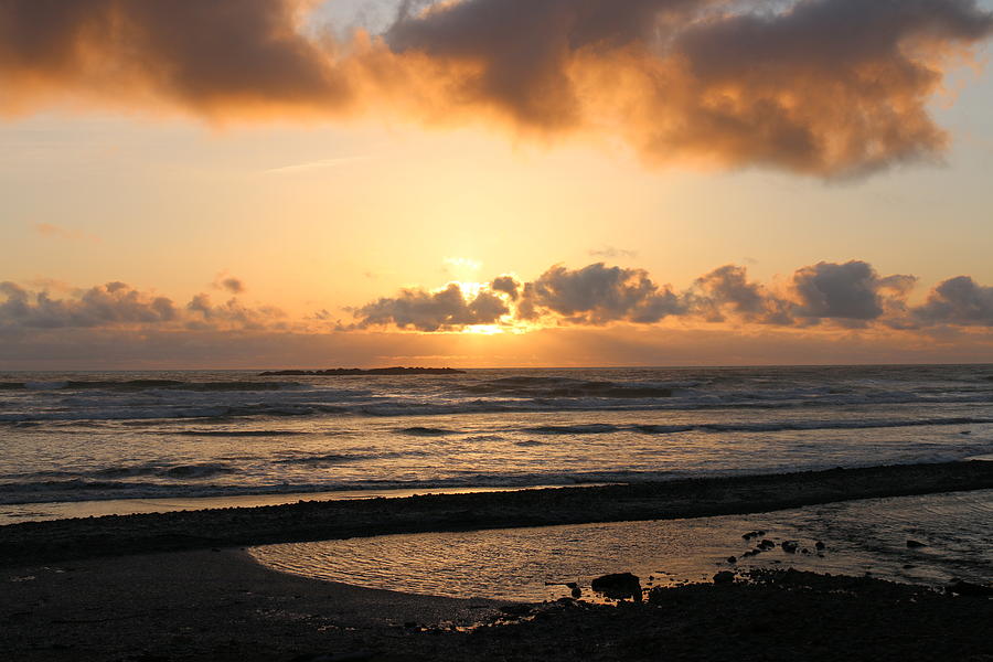 Sunset over the Oregon Coast  Photograph by Christy Pooschke