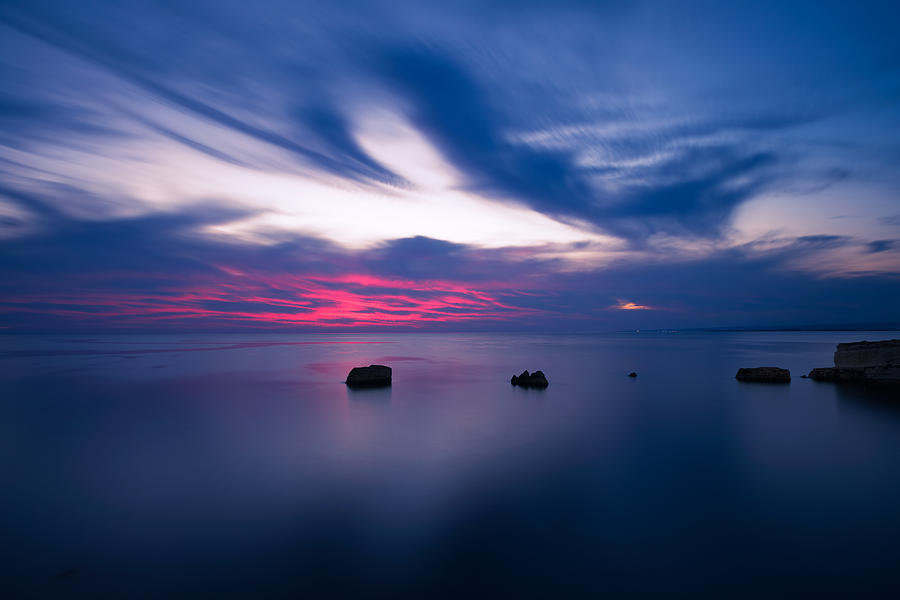 Sunset over the sea by Mirko Chessari Sunset over the sea by Mirko Chessari