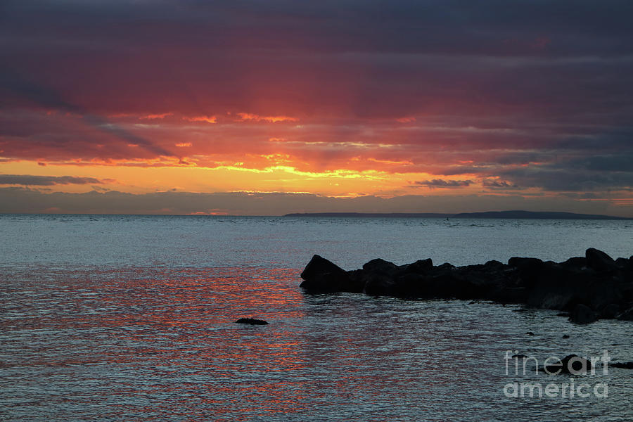 Sunset over the solent Hampshire England UK Photograph by Julia Gavin
