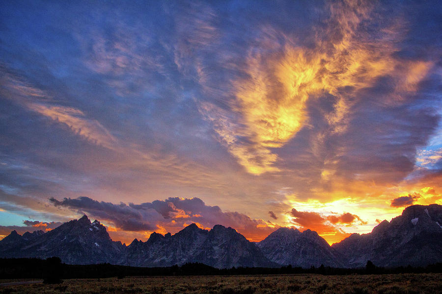 Sunset over the Tetons Photograph by Carolyn Derstine