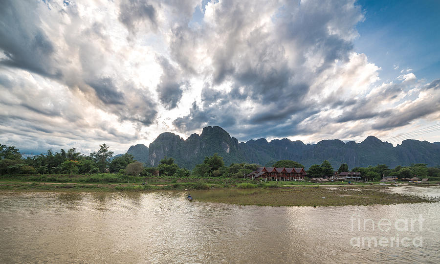 Sunset over Vang Vieng river in Laos Photograph by Didier Marti