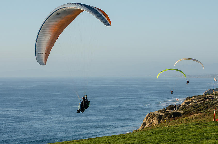 Sunset Paragliders Photograph by Susan McMenamin