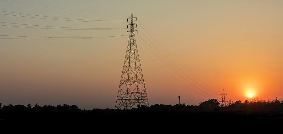 Sunset Pylons Photograph by Chris Cousins