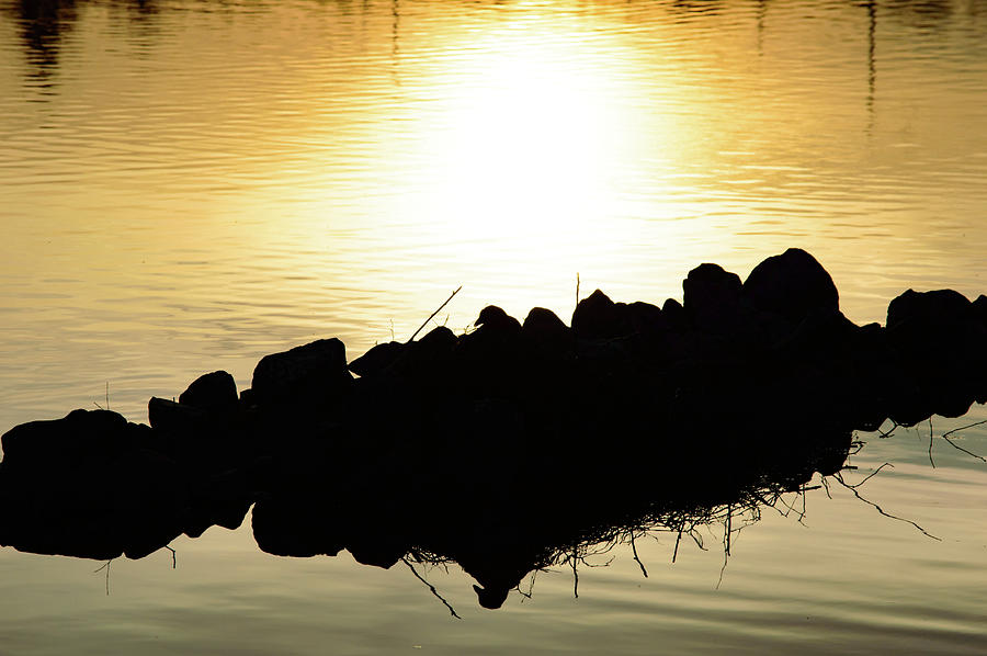Nature Photograph - Sunset reflected in calm water and back lit rocks by Johan Ferret