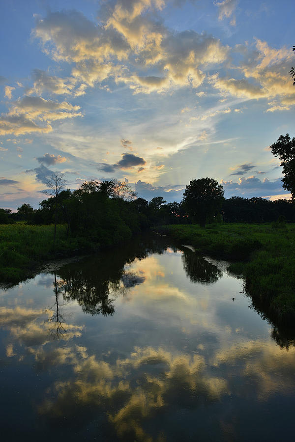 Sunset Reflected in Nippersink Creek Photograph by Ray Mathis