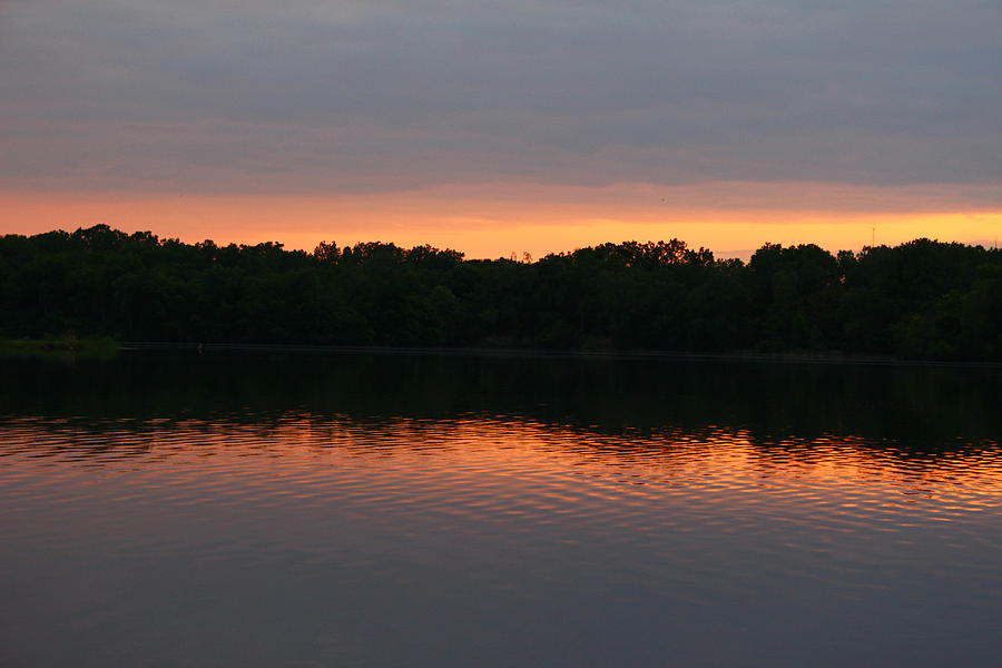 Beautiful Sunset Photograph - Sunset reflections at dusk on lake. by Robert Carey