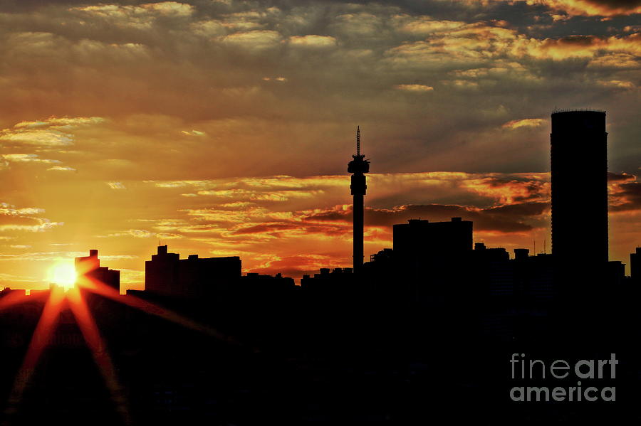 Architecture Photograph - Sunset silhouette view of the Johannesburg skyline by Wesley Lazarus