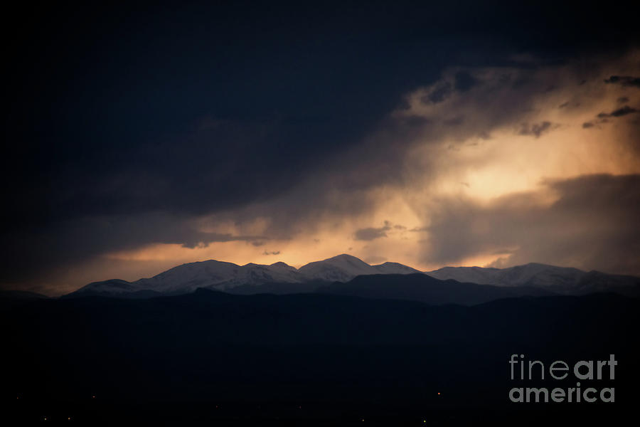 Sunset Photograph - Sunset storm over the Rockies by Bob Hislop