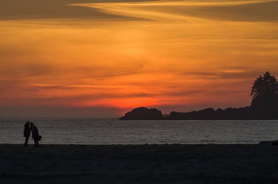 Beach Photograph - Sunset Stroll by Bob Corson