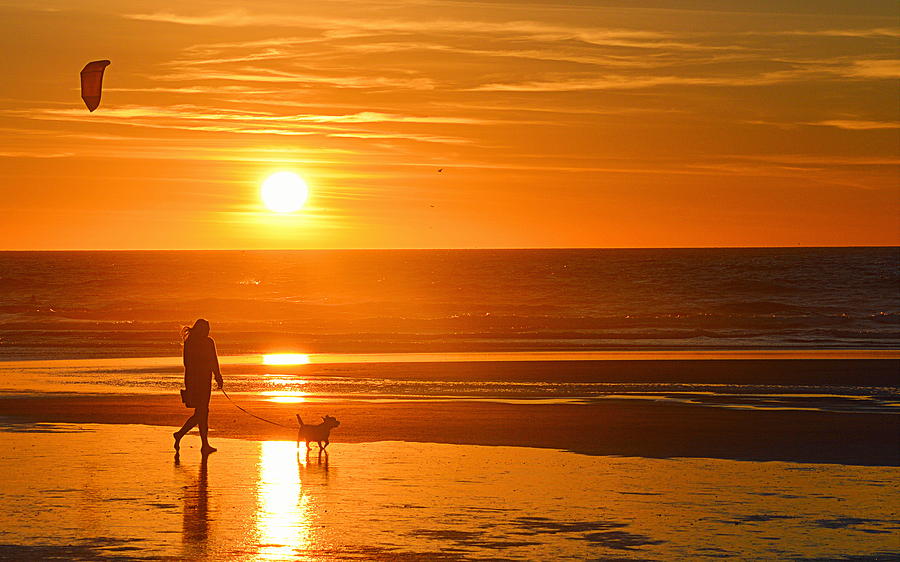 Sunset Stroll on the Beach Photograph by AJ Schibig