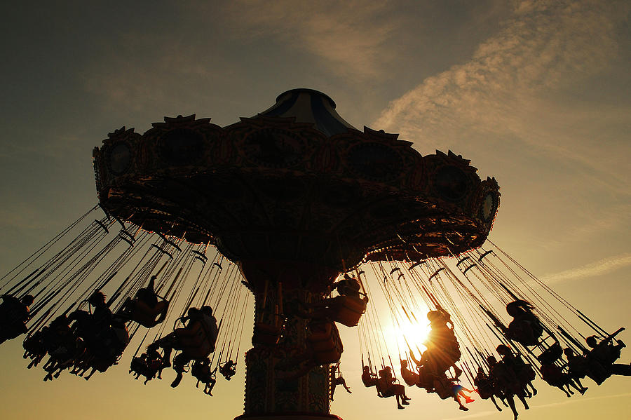 Sunset Swing ride Photograph by James Kirkikis