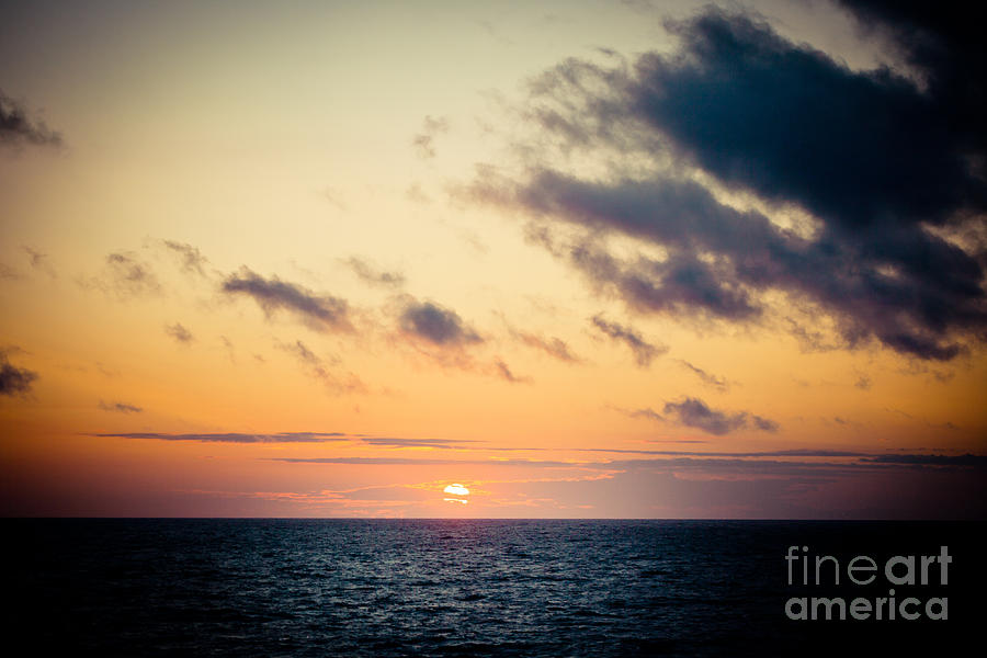 Sunset under sea Photograph by Raimond Klavins