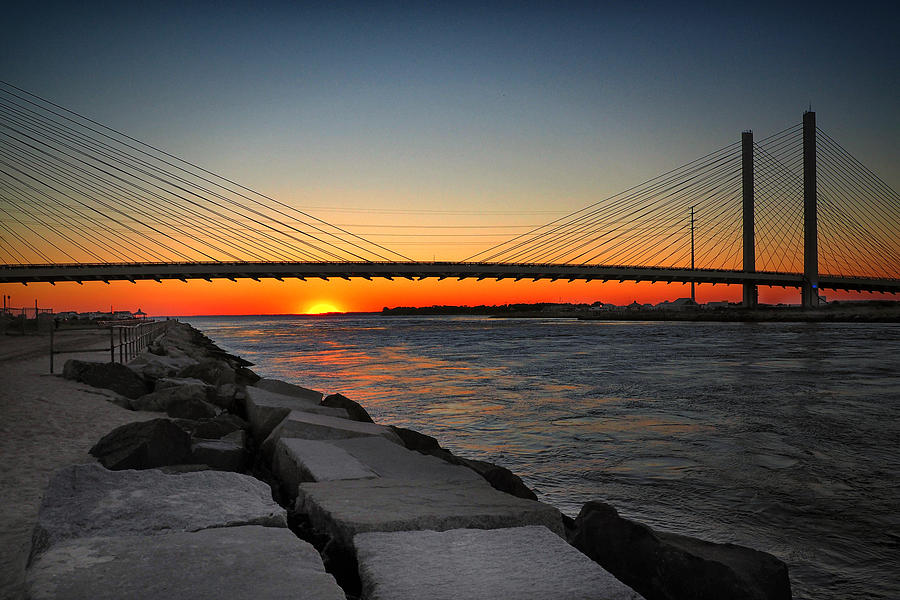 Sunset Under the Indian River Inlet Bridge Photograph by Bill Swartwout