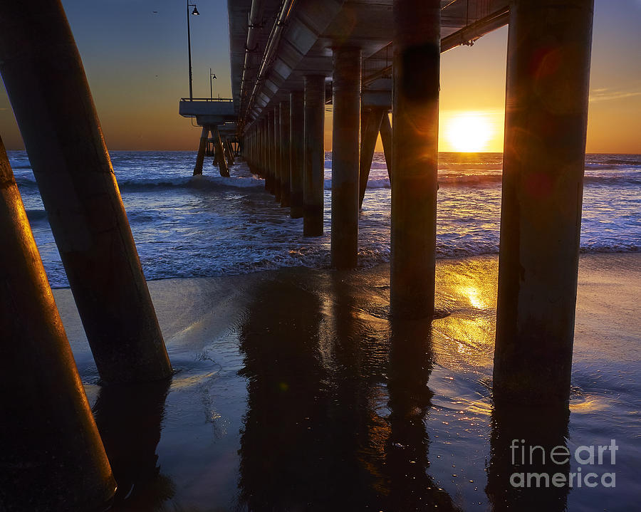 Sunset under the Pier Photograph by Steve Ondrus