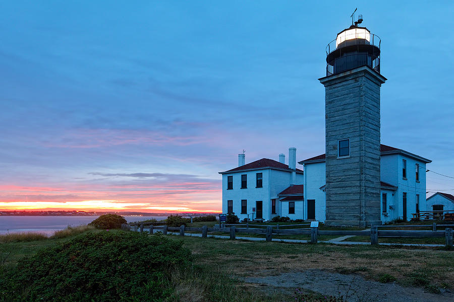 Sunset View of the Beavertail Lighthouse Photograph by George Oze